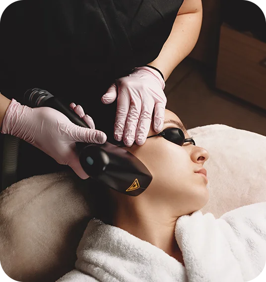 Client receiving laser hair removal treatment on the face or body.